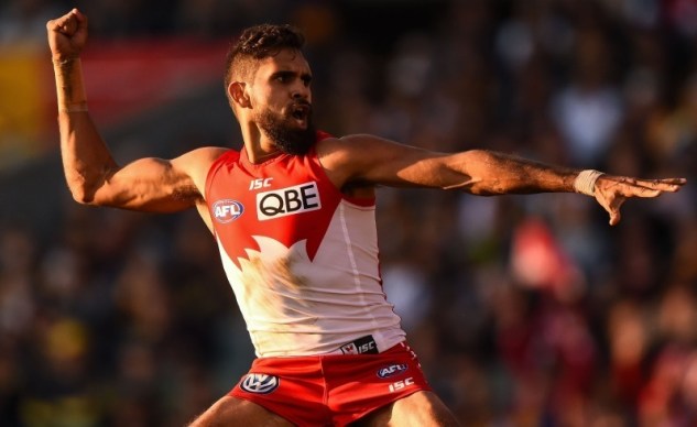 PERTH, AUSTRALIA - JULY 26: Lewis Jetta of the Sydney Swans celebrates his goal with an Indigenous Dance during the 2015 AFL round 17 match between the West Coast Eagles and the Sydney Swans at Domain Stadium, Perth, Australia on July 26, 2015. (Photo by Daniel Carson/AFL Media/Getty Images)